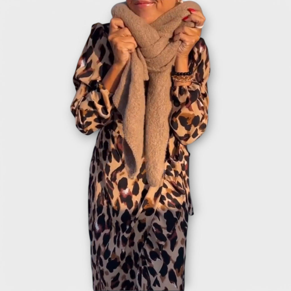 Leopard print wrap-style dress with V-neckline and adjustable waist tie