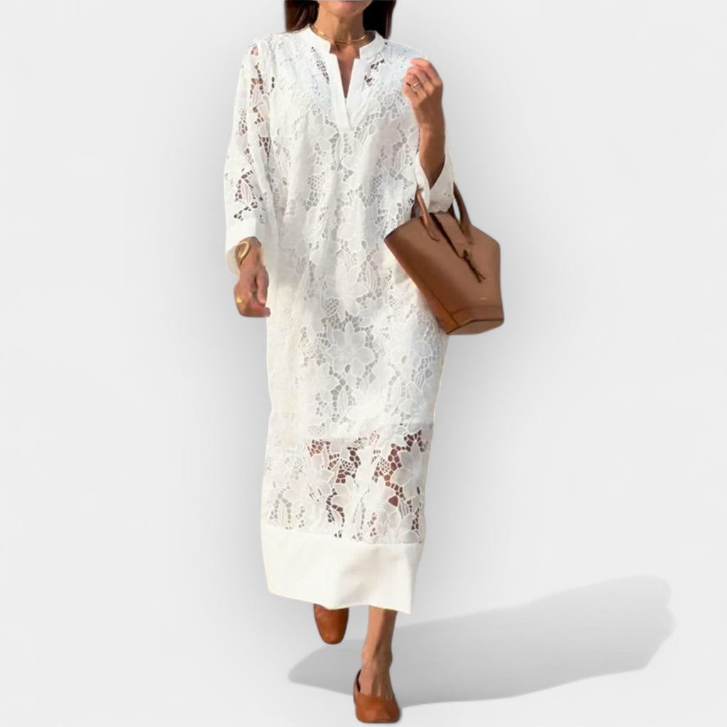 Oversized floaty white dress with a relaxed free-falling silhouette