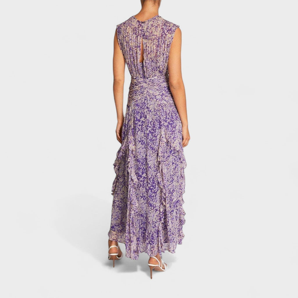 A purple floral fluid midi dress with a gently fitted bodice and flowing skirt