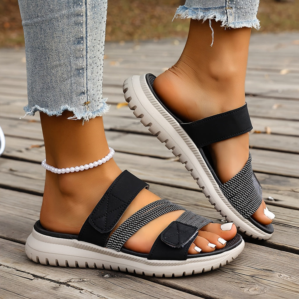 Navy sport flat sandals with elastic straps and cushioned sole