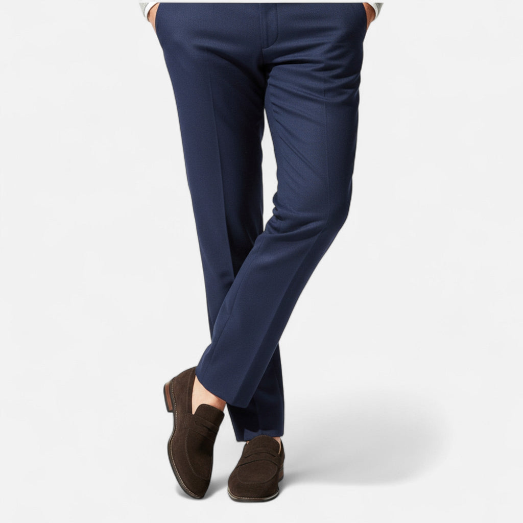 Men's tan coffee penny loafers with a clean structured upper and classic loafer silhouette