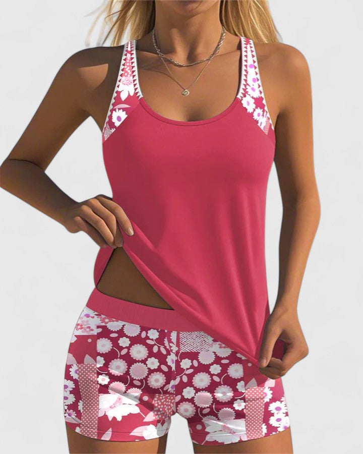 A woman wearing a comfortable swimsuit with a lively print, relaxed and carefree by the pool.