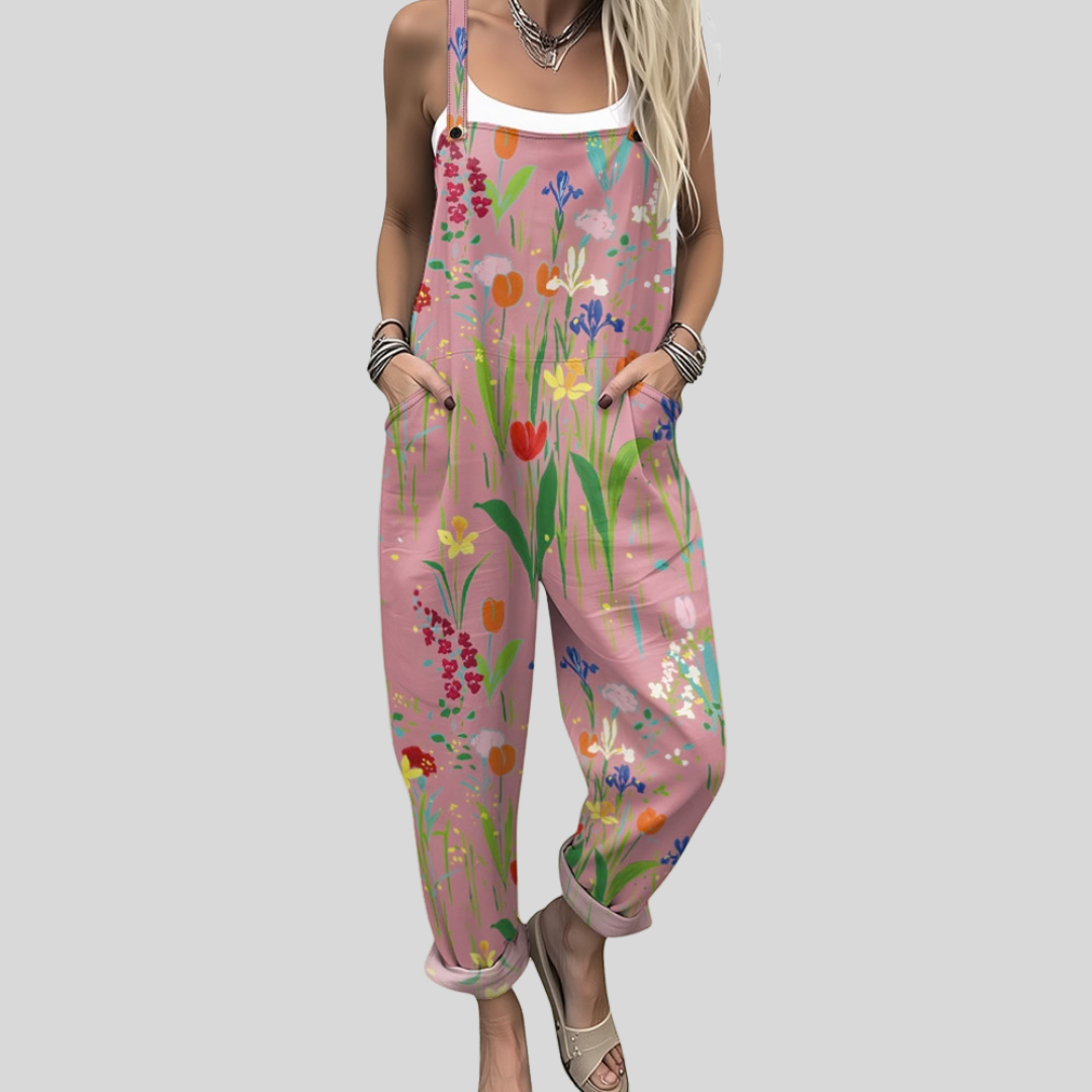 Dusky pink wide-leg dungarees scattered with delicate wildflower blooms in multiple colours.