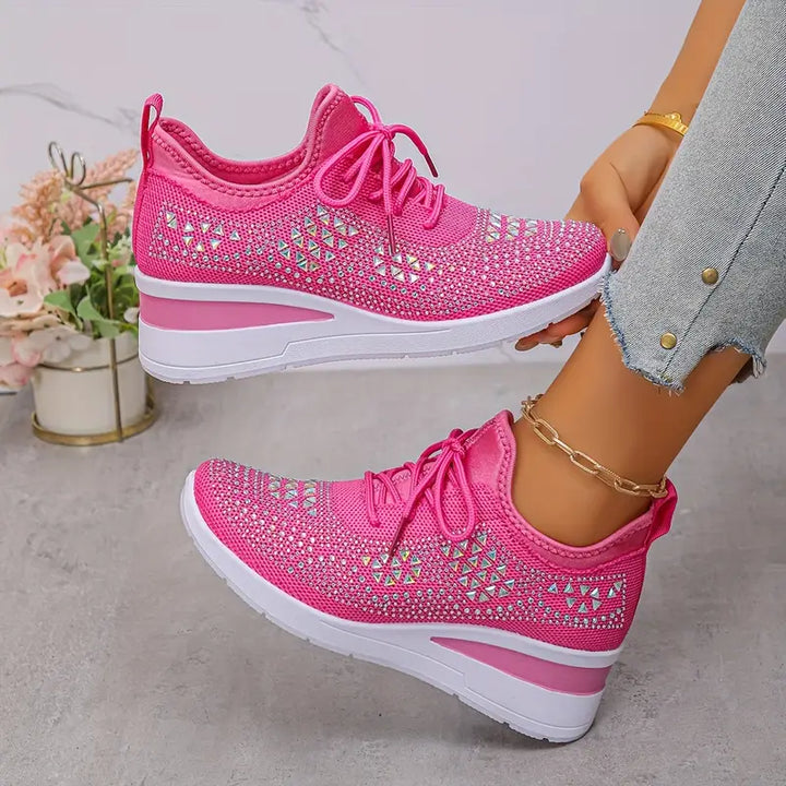 Women's supportive trainers in white with a cushioned sole and clean modern design