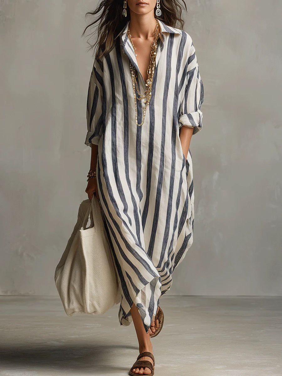 Women's striped maxi dress in pink and white with a classic shirt collar and flowing silhouette