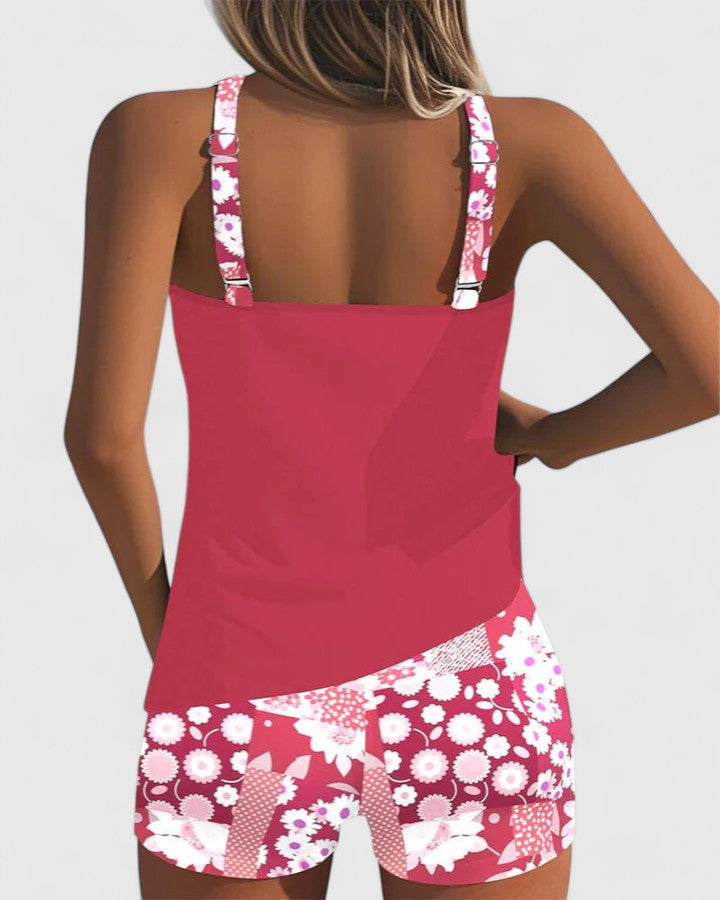 A woman wearing a comfortable swimsuit with a lively print, relaxed and carefree by the pool.