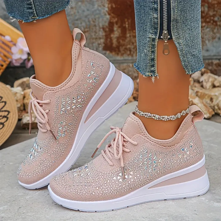 Women's supportive trainers in white with a cushioned sole and clean modern design