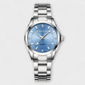 Women's stainless steel classic watch in pale blue with a minimal polished face