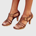 Elegant orthopaedic heels in brown and black with a stable, structured shape