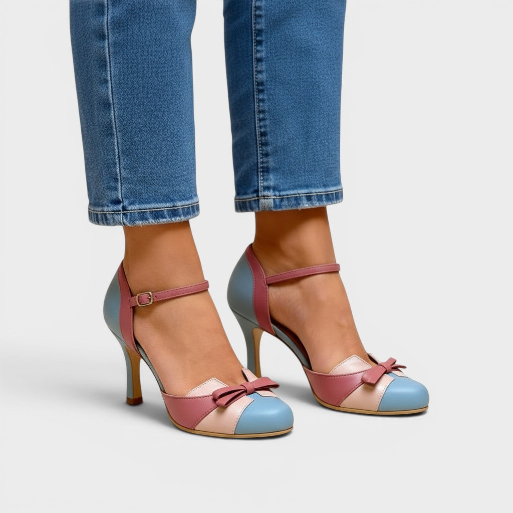 Women's elegant cushioned heels in blue with a stable mid-height heel and refined silhouette