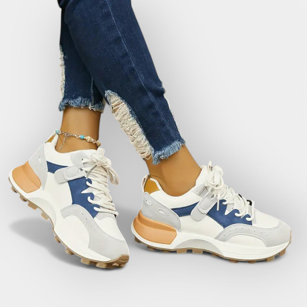 Women's ergonomic daily trainers with cushioned sole in a modern clean design
