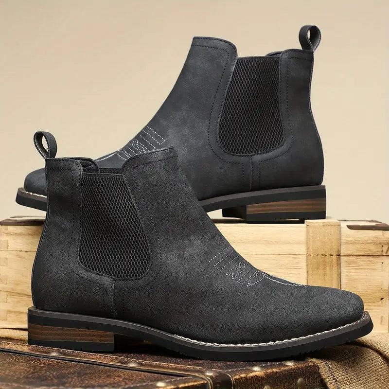 Men's brown smart Chelsea boots with elastic side panels and a sturdy structured sole