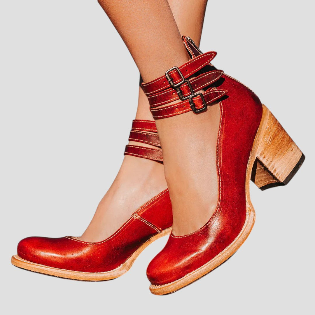 A woman walking on an autumn day wearing elegant wide-fit orthopaedic boots.