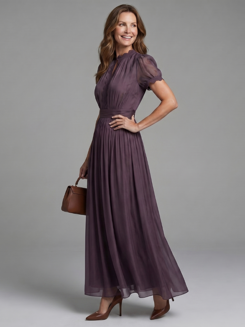 Purple maxi dress with keyhole front neckline, ruched body and flowing skirt