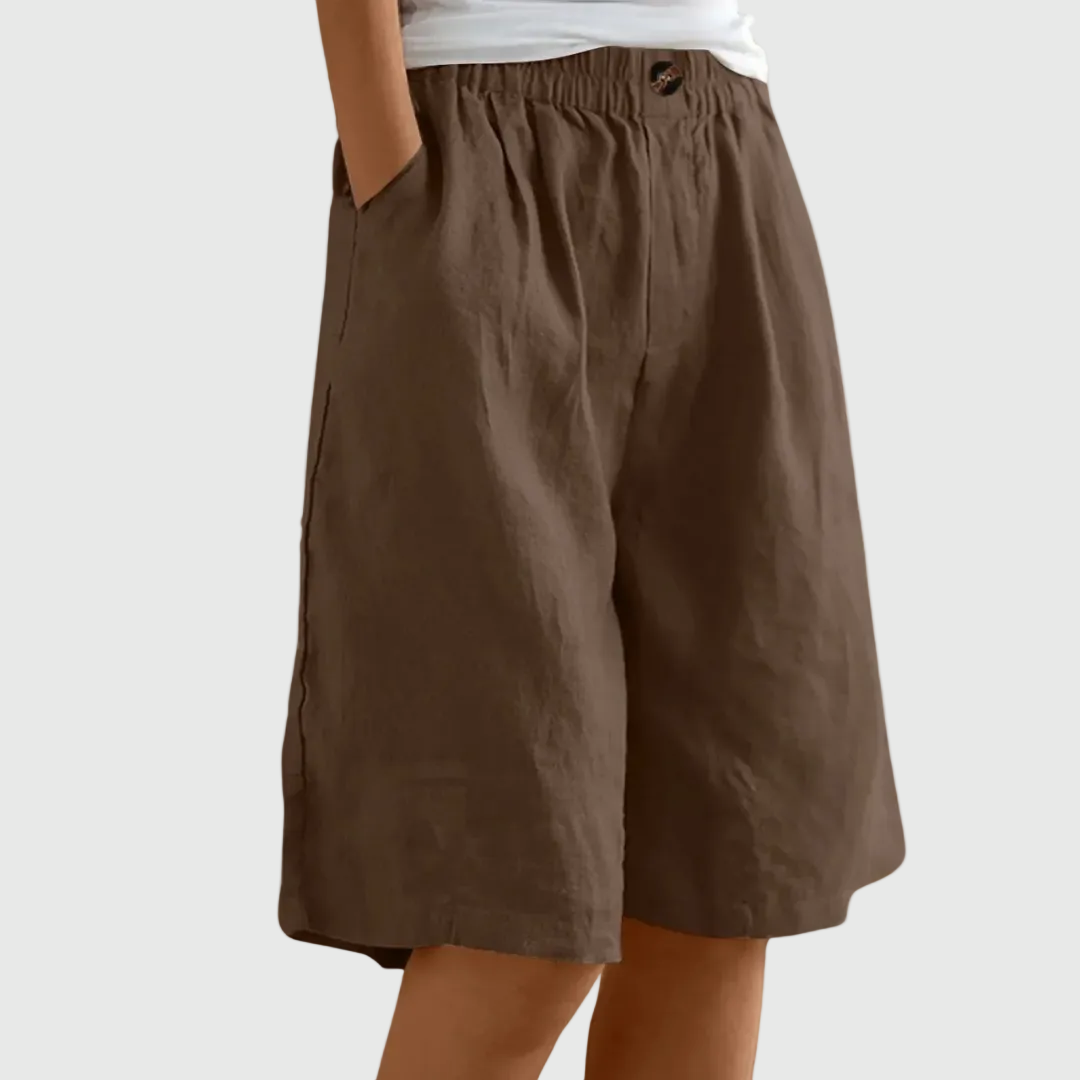 Women's casual leisure shorts in soft pink with an elasticated waist and relaxed fit