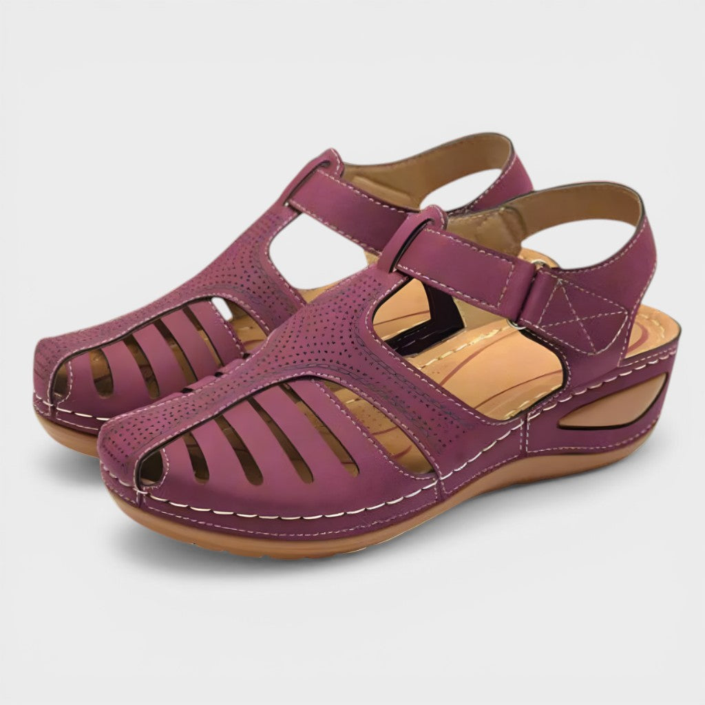 Orthopaedic corrective sandals in navy and burgundy with a supportive, adaptive design