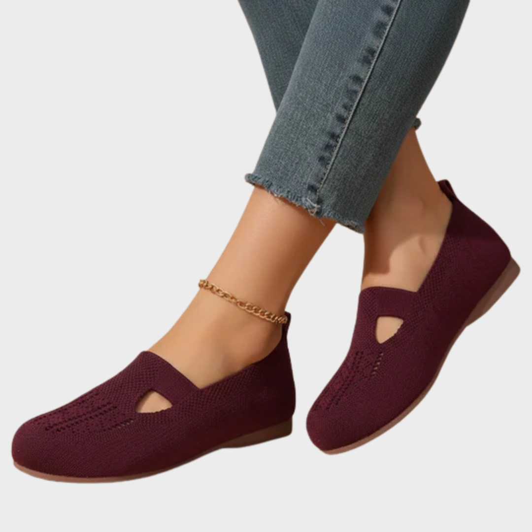 Closed breathable ballet flats in a warm beige tone with a clean, simple silhouette