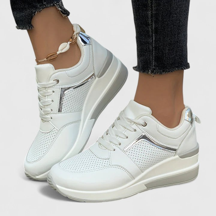 A woman standing comfortably in cushioned orthopaedic shoes