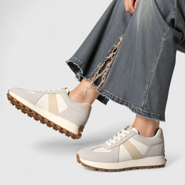 A woman wearing elegant shoes with a discreet height lift