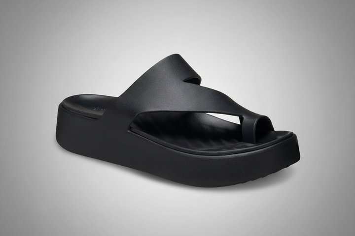 Minimalist cushioned sandal in a clean, low-profile modern design suitable for everyday wear