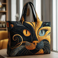 Quilted tote bag with a mystic cat surrounded by celestial details on a wave-stitch body