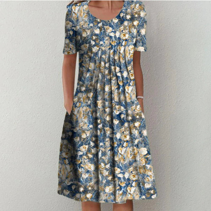 Woman wearing the floral midi dress with pockets, walking outdoors on a sunny day.