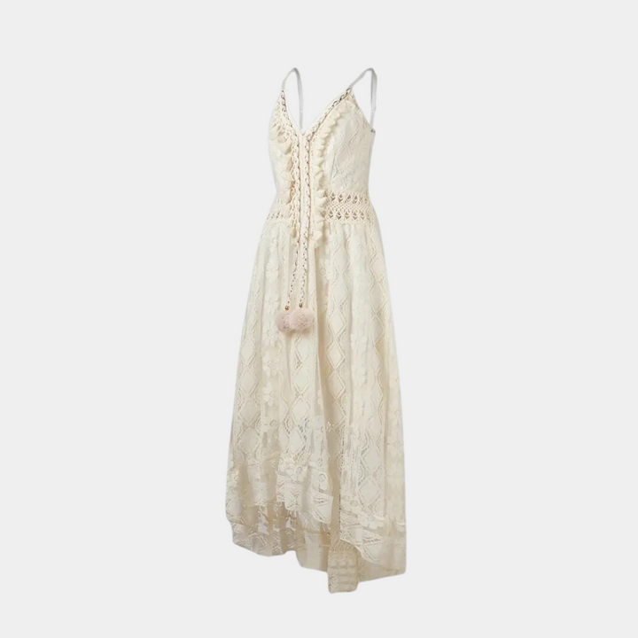 Woman wearing the Alice™ elegant boho midi dress with intricate detailing and a V-neckline at a summer garden party.