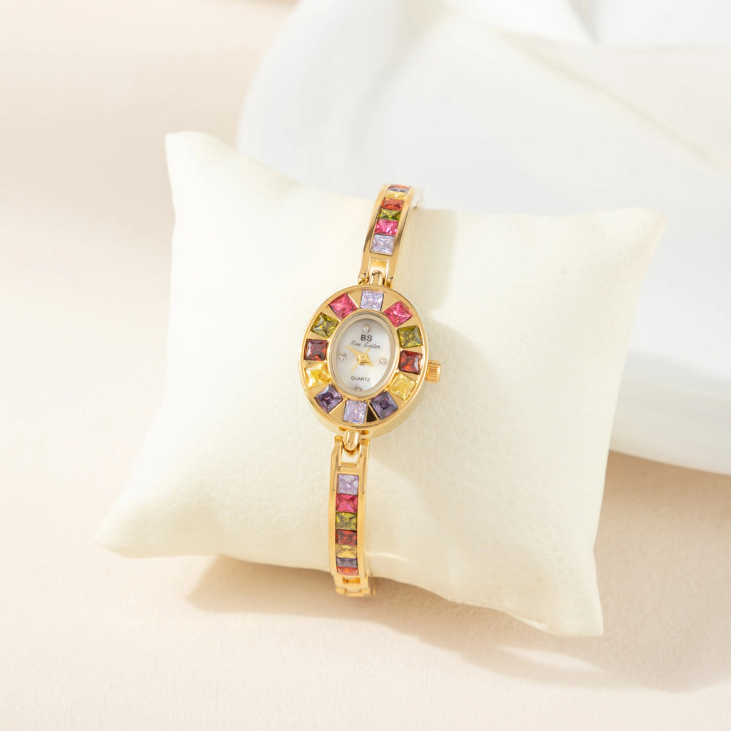 Women's colourful watch with golden detail trim in gold tones