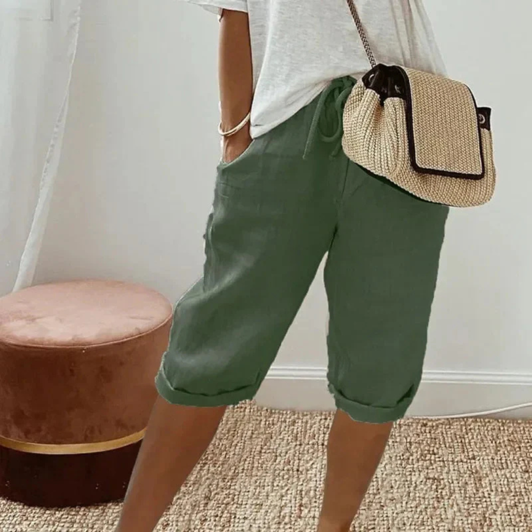 A pair of relaxed-fit summer shorts in beige with an elasticated drawstring waist