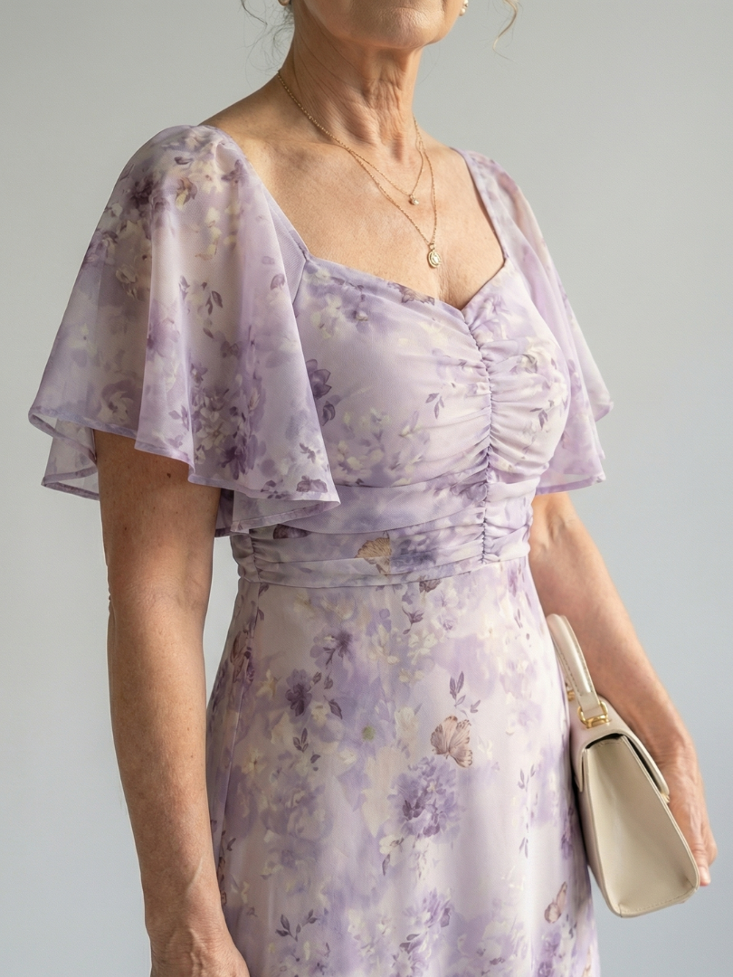 Floral midi dress with a square neckline and short flutter sleeves in a delicate print