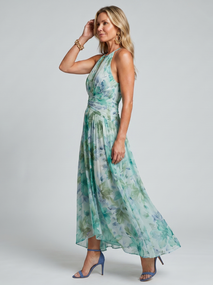 Green floral halter-neck midi dress with subtle keyhole neckline and pleated flowing skirt