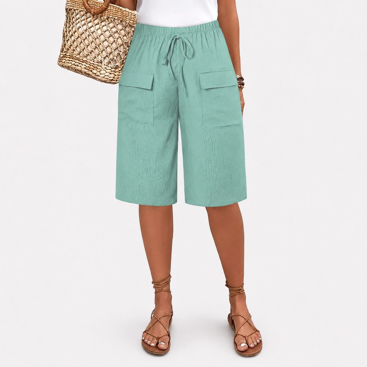 Women's high-waist shorts in terracotta with a relaxed leg and elasticated waistband