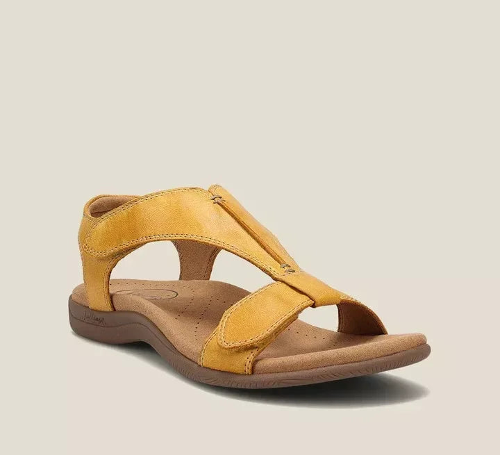 Flat T-bar sandals in classic black with a clean, simple upper