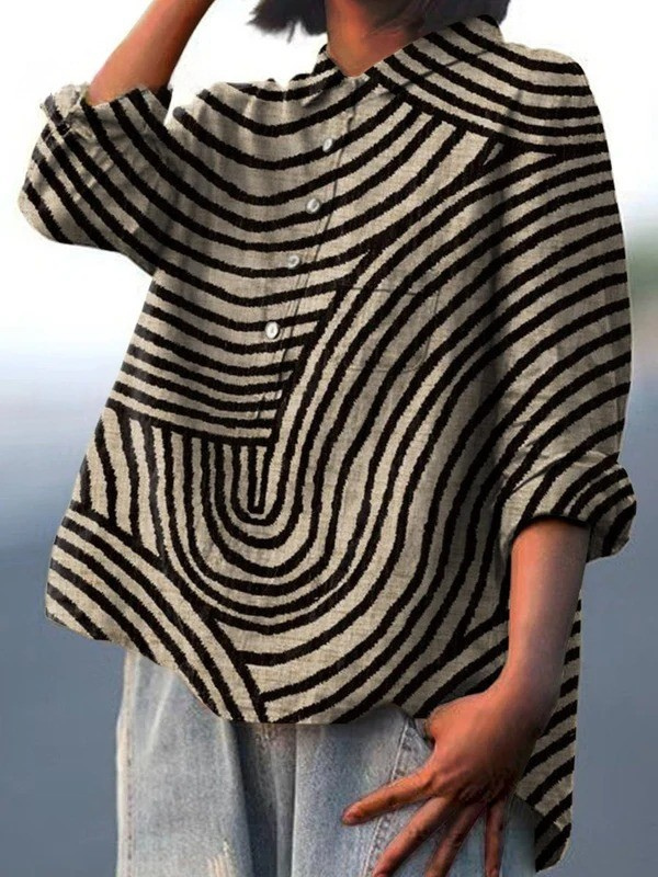 A multicolour light classic top with a clean, relaxed and timeless silhouette