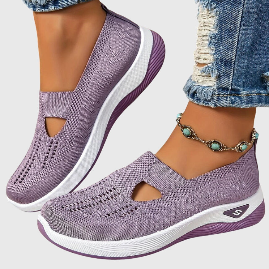 A woman out for a long walk in supportive orthopaedic walking shoes.