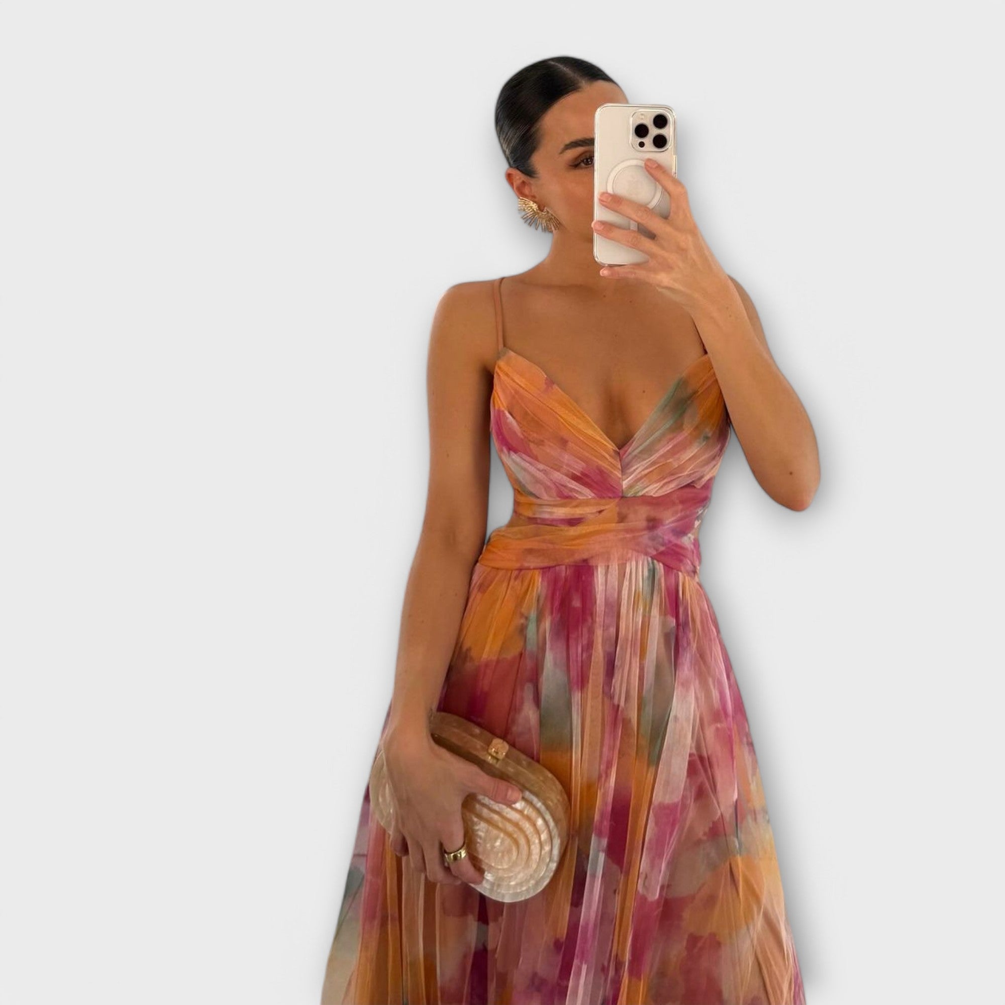 Women's fine-strap maxi dress in orange with a flowing skirt and relaxed summery feel