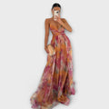 Women's fine-strap maxi dress in orange with a flowing skirt and relaxed summery feel