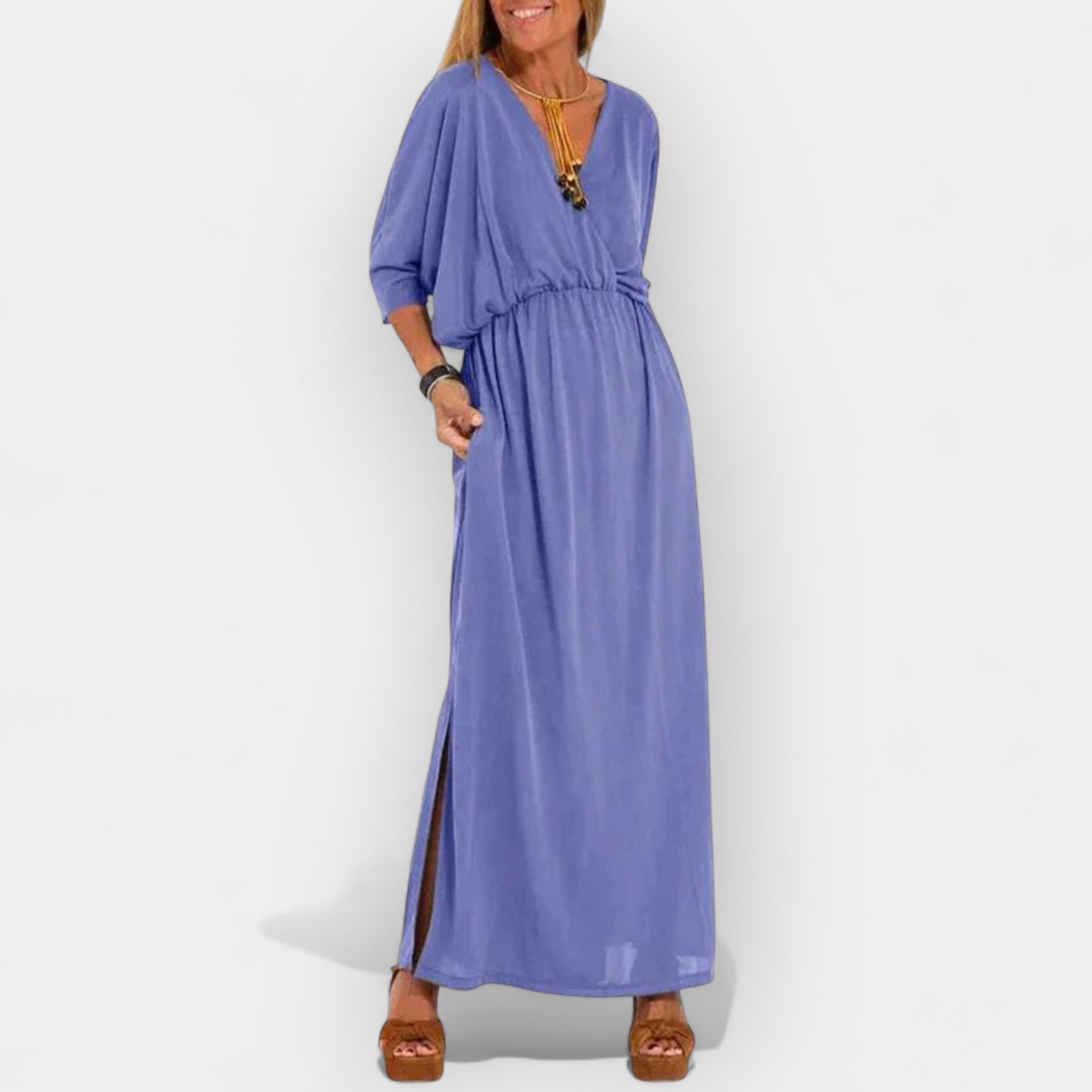 Long floaty retro-inspired dress in soft grey with a graceful, fluid silhouette
