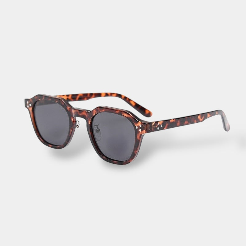 Yacht-inspired round polarised sunglasses with a lightweight frame in green-brown tones