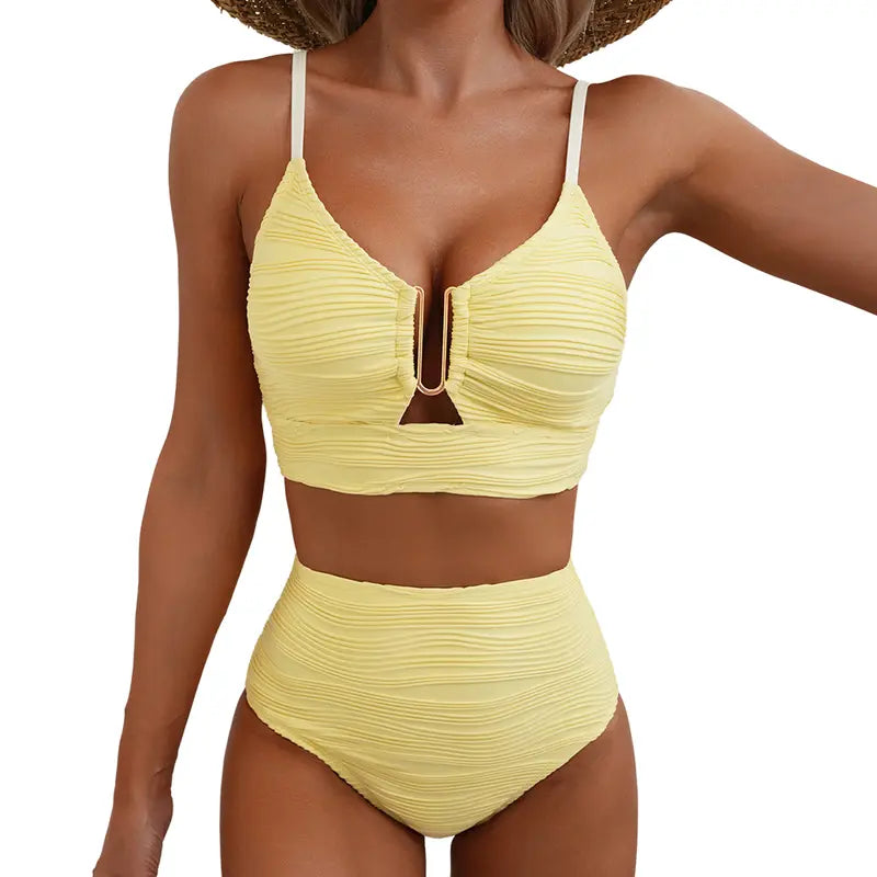 Black high-waist bikini with gold zip detail on the top and ruched briefs
