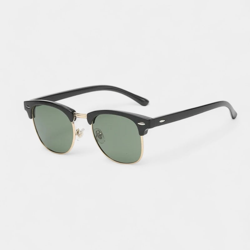 Men's vintage classic sunglasses in black and gold with a refined, understated frame