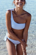 Blue one-shoulder bikini set with asymmetric top and mid-rise briefs