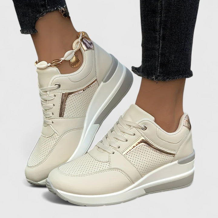 A woman standing comfortably in cushioned orthopaedic shoes