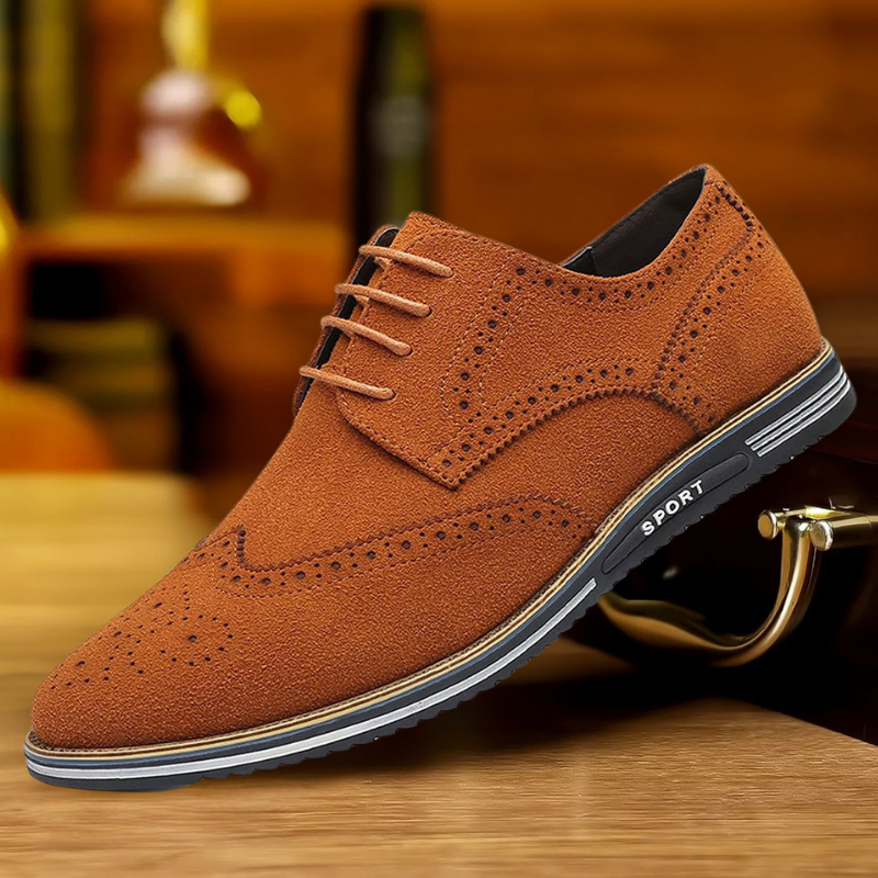 Men's black luxury dress shoes with a sleek pointed silhouette and polished smooth upper