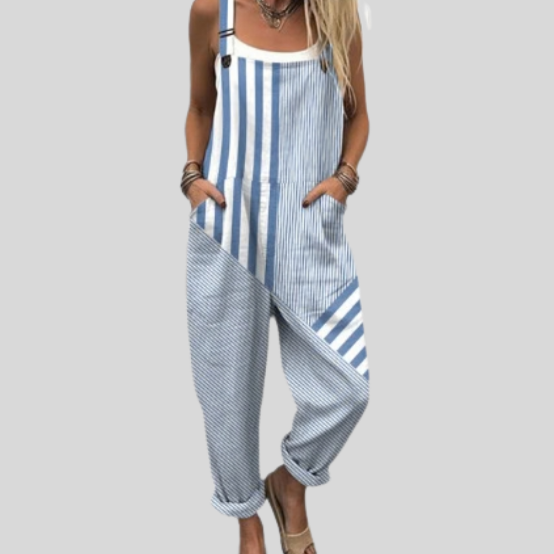 Woman wearing the Gráinne™ wide-leg dungarees in a fresh blue and white mixed maritime stripe pattern.