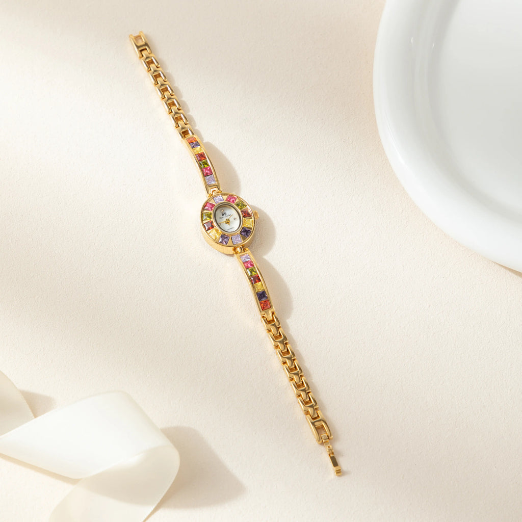 Women's colourful watch with golden detail trim in gold tones