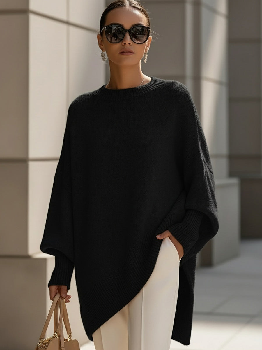 A woman wearing a soft crew neck jumper with jeans for a warm, easy everyday look.