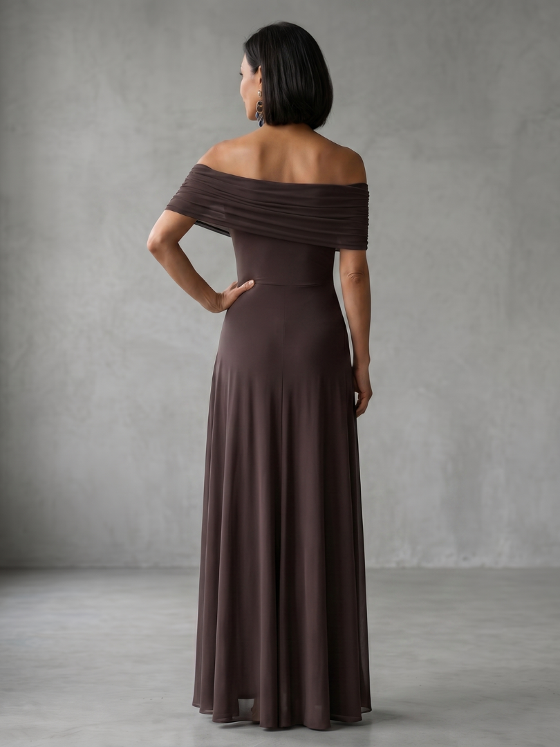 Brown midi dress with off-shoulder draped neckline and sheer outer layer over smooth lining