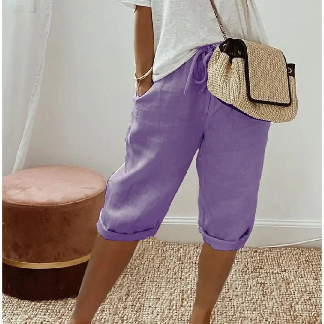 A pair of relaxed-fit summer shorts in beige with an elasticated drawstring waist