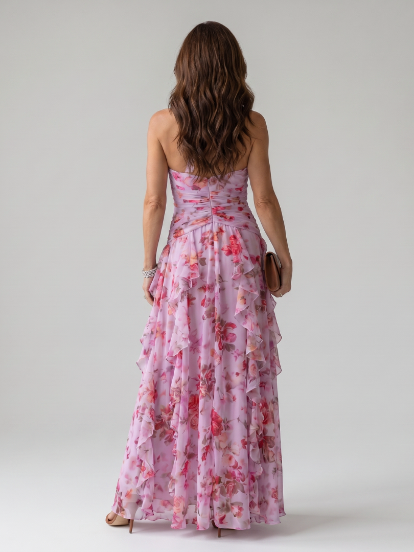 Pink floral halter maxi dress with a ruched bodice and layered ruffle skirt